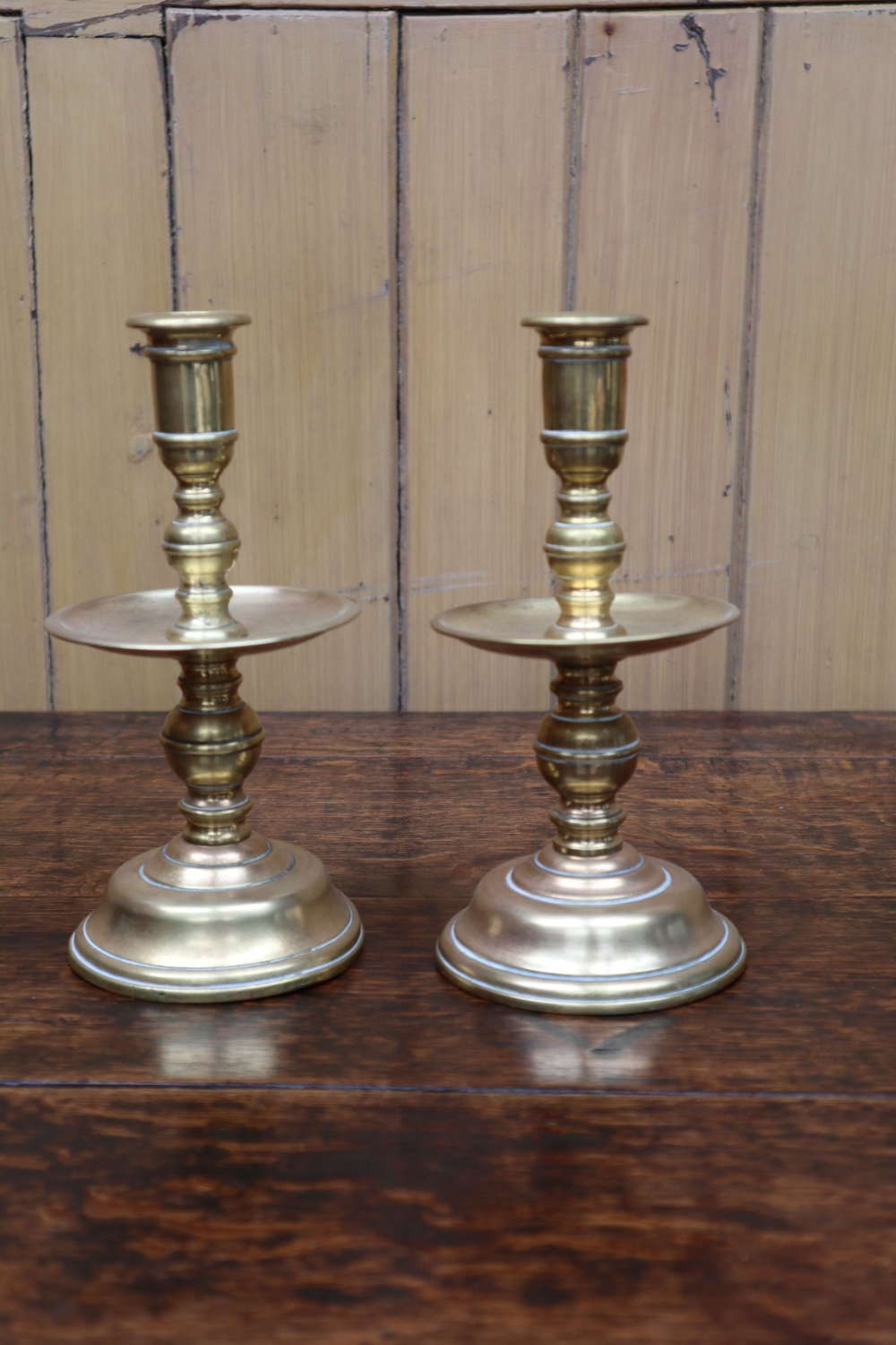 19th Century pair of brass 'Heemskerk' Dutch style candlesticks