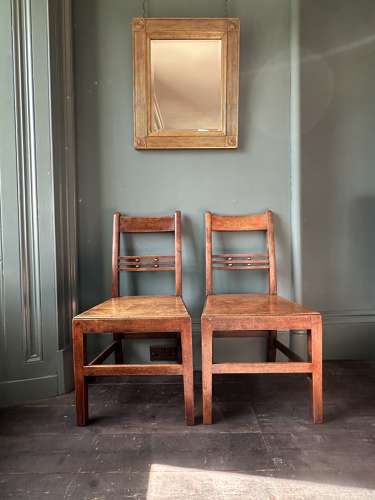A pair of Early 19th Century Suffolk ball back vernacular side chairs