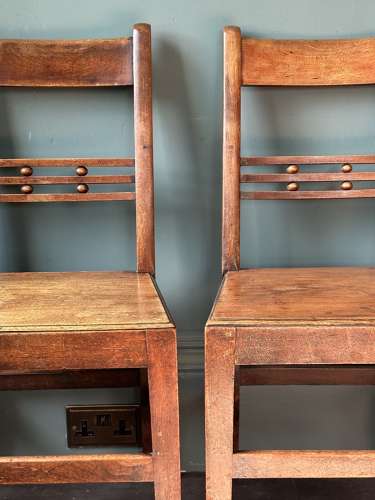 A pair of Early 19th Century Suffolk ball back vernacular side chairs