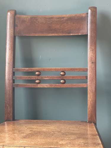 A pair of Early 19th Century Suffolk ball back vernacular side chairs